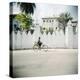 Man on Bicycle with Old Buildings Behind, Stone Town, Zanzibar, Tanzania, East Africa, Africa-Lee Frost-Premier Image Canvas
