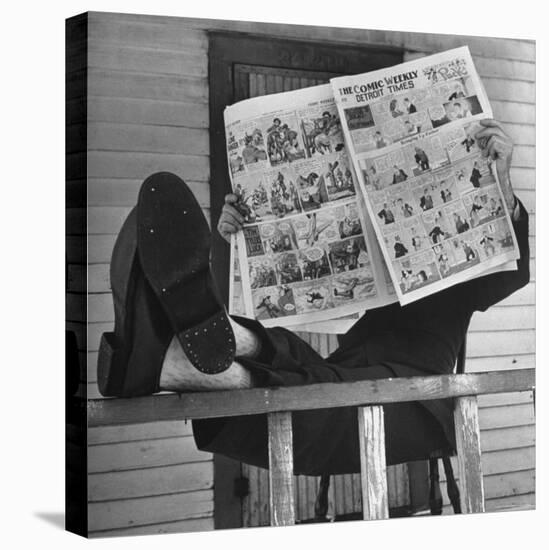 Man Reading the Comics Section of the Detroit Times on a Typical Sunday During WWII-Walter Sanders-Premier Image Canvas