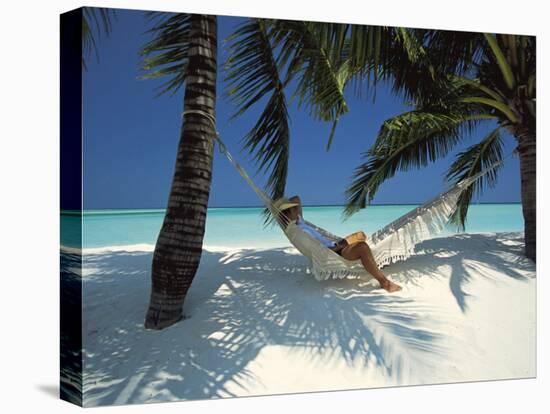 Man Relaxing on a Beachside Hammock, Maldives, Indian Ocean-Papadopoulos Sakis-Premier Image Canvas