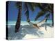 Man Relaxing on a Beachside Hammock, Maldives, Indian Ocean-Papadopoulos Sakis-Premier Image Canvas