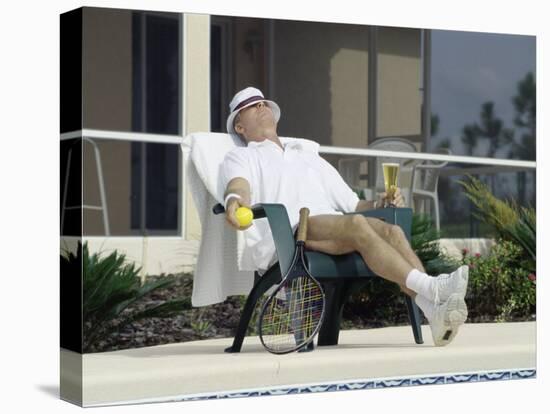 Man Relaxing with a Beer After His Tennis Match-null-Premier Image Canvas