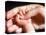 Man's Hand Holding Baby's Hand-Mitch Diamond-Premier Image Canvas