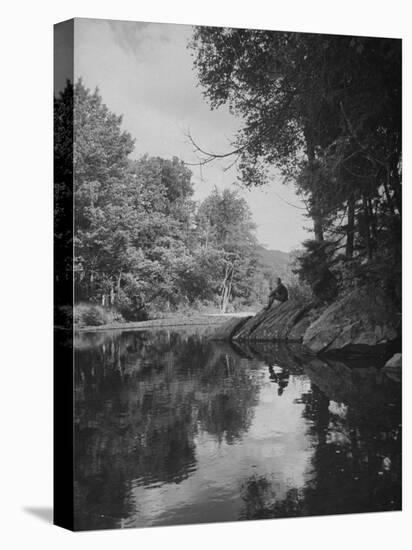 Man Sitting on the Bank of the Upper Opalescent River, a Branch of the Hudson-Margaret Bourke-White-Premier Image Canvas