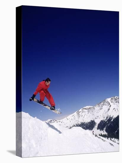 Man Snowboarding (Mid-Air), Arapahoe Basin, CO-null-Premier Image Canvas