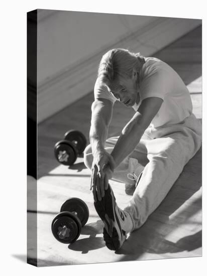 Man Stretching in Gym, New York, New York, USA-Chris Trotman-Premier Image Canvas