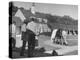 Man Walking Horse in Front of Stables at Rolling Rock Fox Hunt-null-Premier Image Canvas