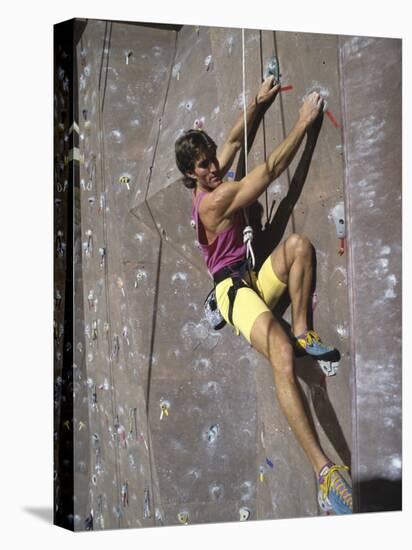 Man Wall Climbing Indoors-null-Premier Image Canvas