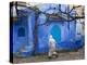 Man Wearing a Djellaba on the Street, Chefchaouen, Morocco-Peter Adams-Premier Image Canvas