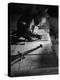 Man Welding Pieces of Metal Together-Allan Grant-Premier Image Canvas