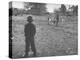 Man Working on the Farm after it Has Rained-null-Premier Image Canvas