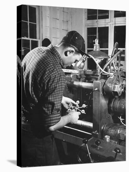 Man Working with Molded Plastics at Barton Molding Co-Hansel Mieth-Premier Image Canvas