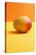 Mango on Coloured Background-Kr?ger and Gross-Premier Image Canvas
