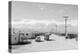 Manzanar street scene, spring, Manzanar Relocation Center, 1943-Ansel Adams-Premier Image Canvas