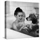 Margaret O'Brien and Her Spaniel Maggie Share a Bubble Bath-Marie Hansen-Premier Image Canvas