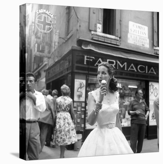 Maria Félix Eating an Ice Cream in Front of a Pharmacy-null-Premier Image Canvas