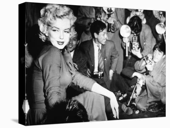 Marilyn Monroe Surronded by Photographers C. 1955-null-Stretched Canvas