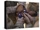 Marines Fold an American Flag after It was Raised in Memory of a Fallen Soldier-Stocktrek Images-Premier Image Canvas