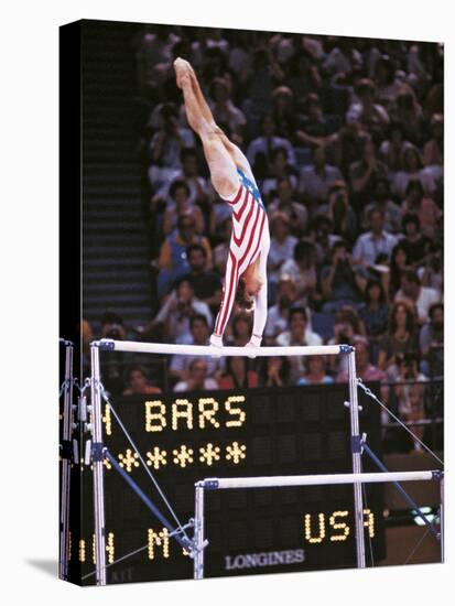 Mary Lou Retton on the Uneven Bars at the Los Angeles Olympic Games-null-Premier Image Canvas
