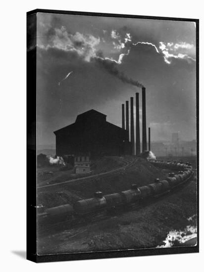 Massive Otis Steel Mill Surrounded by Tanker Cars on Railroad Track on a Cloudy Day-Margaret Bourke-White-Premier Image Canvas