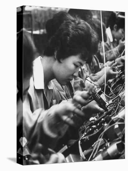 Matsushita Electronics Corp. Women Employees Working in a Factory-Bill Ray-Premier Image Canvas