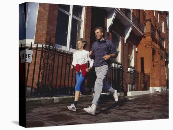 Mature Couple Out on a Fitness Run-Chris Cole-Premier Image Canvas