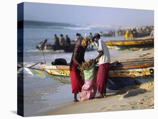 Mauritania, Nouakchott Fishermen Unload Gear from Boats Returning to Shore at Plage Des Pecheurs-Andrew Watson-Premier Image Canvas
