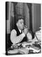 Mayor Fiorello LaGuardia Using Lighter to Light His Cigar While Sitting at His Desk in His Office-William C^ Shrout-Premier Image Canvas