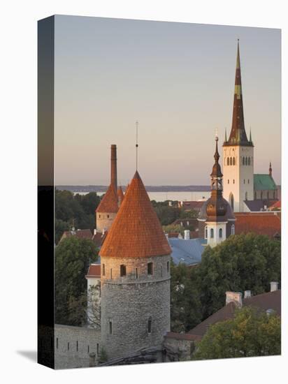 Medieval Town Walls and Spire of St. Olav's Church at Dusk, Tallinn, Estonia, Baltic States-Neale Clarke-Premier Image Canvas