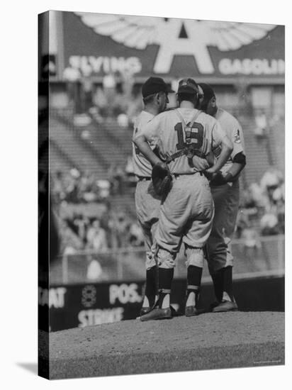 Members of the Cleveland Indians Conferring on the Mound During a Game-Yale Joel-Premier Image Canvas