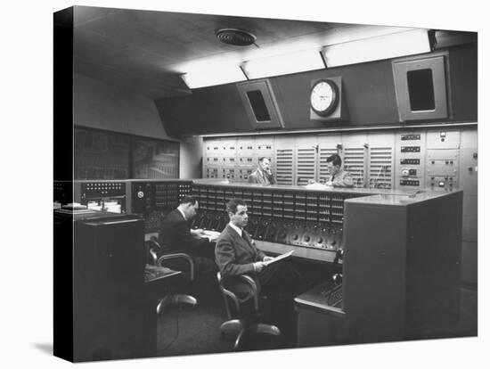 Members of Voice of America Hard Away at Working in a Computer Room-null-Premier Image Canvas