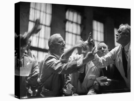 Men Arguing over Stock Exchanges-Ralph Morse-Premier Image Canvas