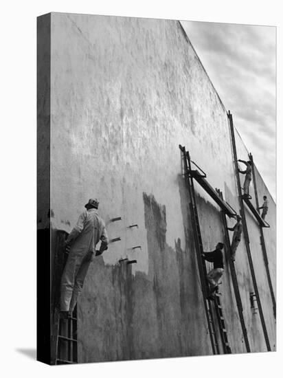 Men on Ladders Painting Exterior Wall of Building in Preparation for Opening of the World's Fair-Alfred Eisenstaedt-Premier Image Canvas