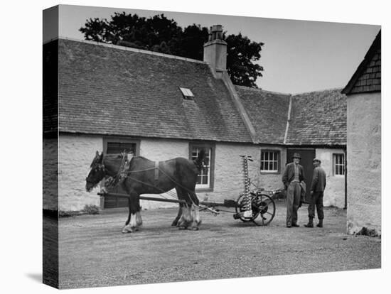 Men Standing Near Horse-Drawn Farming Equipment-null-Premier Image Canvas