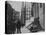 Men Walking by the Statue of George Washington on Wall St-Wallace G^ Levison-Premier Image Canvas