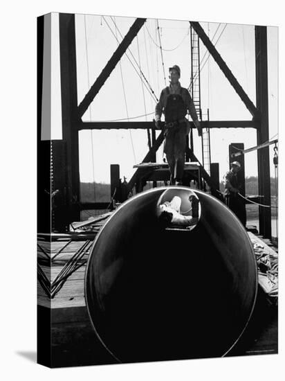 Men Working on the Texas Illinois Natural Gas Company's Pipeline Suspension Bridge-John Dominis-Premier Image Canvas