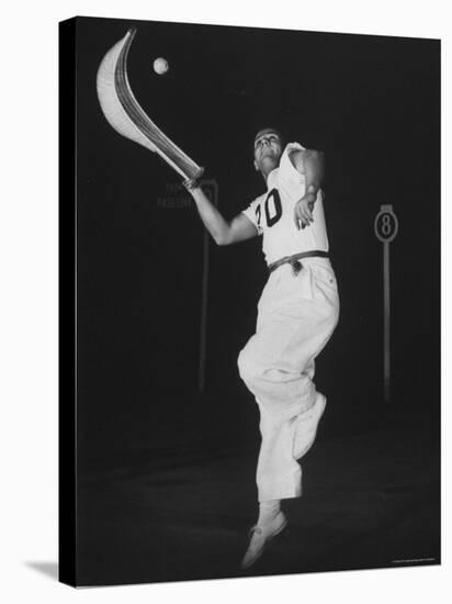 Mexican Jai Alai Player Segundo Jumping to Reach Pelota in Game at Hippodrome-Gjon Mili-Premier Image Canvas