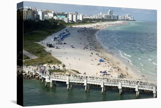 Miami Beach in Florida, with People Sunbathing on Golden Sands and the Waves from the Blue Sea-Natalie Tepper-Stretched Canvas