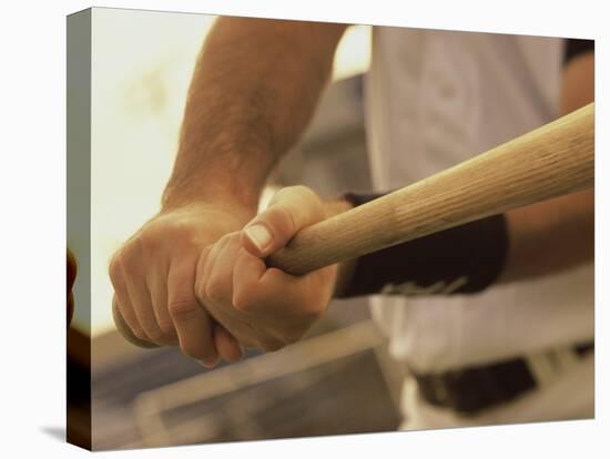 Mid Section View of a Baseball Player Swinging a Baseball Bat-null-Premier Image Canvas