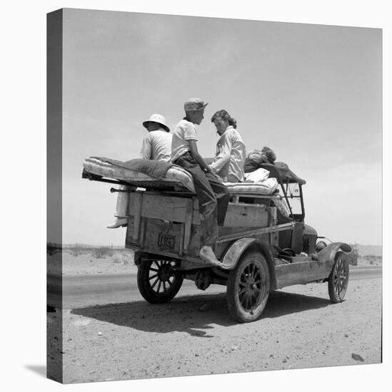 Migratory family traveling in search of work to New Mexico along U.S. Route 70, Arizona, 1937-Dorothea Lange-Premier Image Canvas