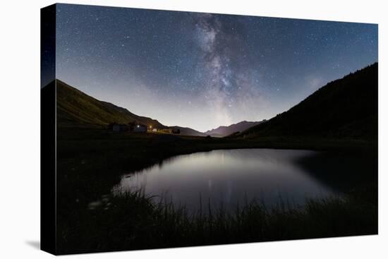 Milky Way over the alpine pond of Pozza Blu, Macolini, Madesimo, Valle Spluga, Valtellina, Lombardy-Roberto Moiola-Premier Image Canvas