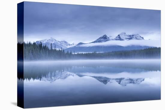 Misty morning at Herbert Lake in the Canadian Rockies, Banff National Park, Alberta, Canada. Autumn-Adam Burton-Premier Image Canvas