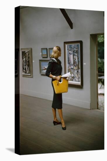 Model in a David Goodstein-Designed Outfit, Looks at Paintings in a Museum, New York, 1954-Nina Leen-Premier Image Canvas