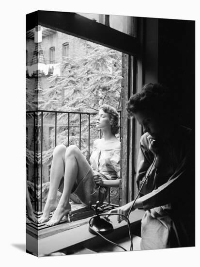 Model Jean Patchet Seated on a Fire Escape, Talks with Eileen Ford, New York, NY, 1948-Nina Leen-Premier Image Canvas