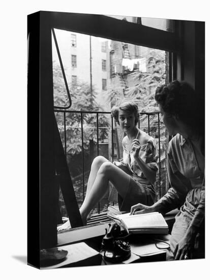 Model Jean Patchet Seated on a Fire Escape, Talks with Eileen Ford, New York, NY, 1948-Nina Leen-Premier Image Canvas