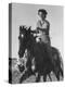 Model Riding a Horse-Allan Grant-Premier Image Canvas