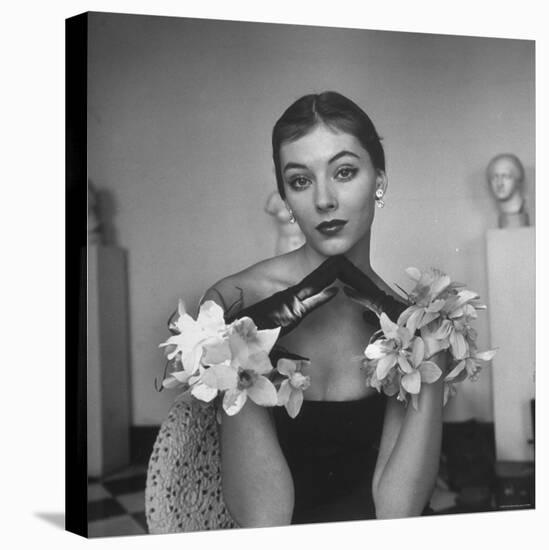 Model Wearing a Flowery Glove While Peering Into the Distance-Nina Leen-Premier Image Canvas
