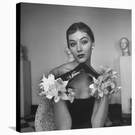 Model Wearing a Flowery Glove While Peering Into the Distance-Nina Leen-Premier Image Canvas