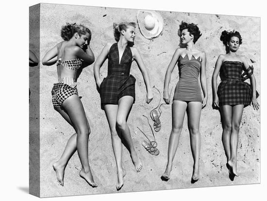 Models Sunbathing, Wearing Latest Beach Fashions-Nina Leen-Premier Image Canvas