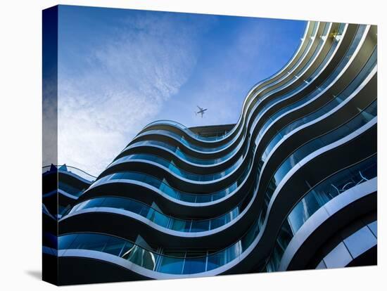 Modern Building with Aeroplane Above-Craig Roberts-Premier Image Canvas