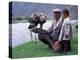 Mongolia, Kasakh Hunter with Eagle by the Khovd River, with a Small Child-Antonia Tozer-Premier Image Canvas